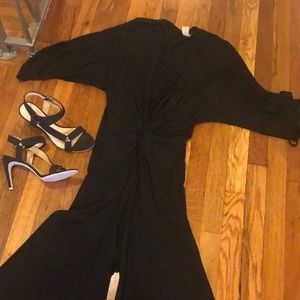 Women’s Deep Plunge Jumpsuit Size L.